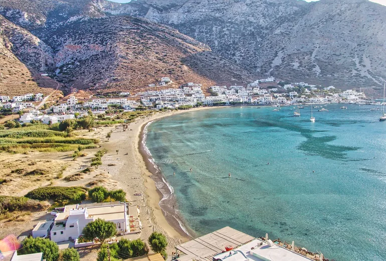 Aerial of Kamares bay on Sifnos with sandy beach and white villages