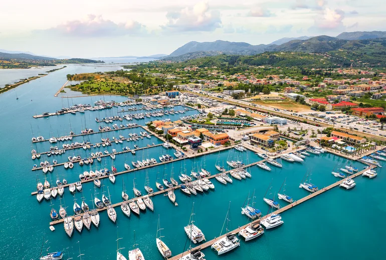 Lefkada town marina pontoons packed with charter yachts