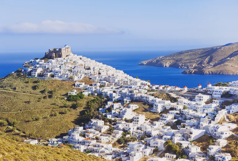 Whitewashed hilltop chora of Astypalaia crowned by its Venetian castle